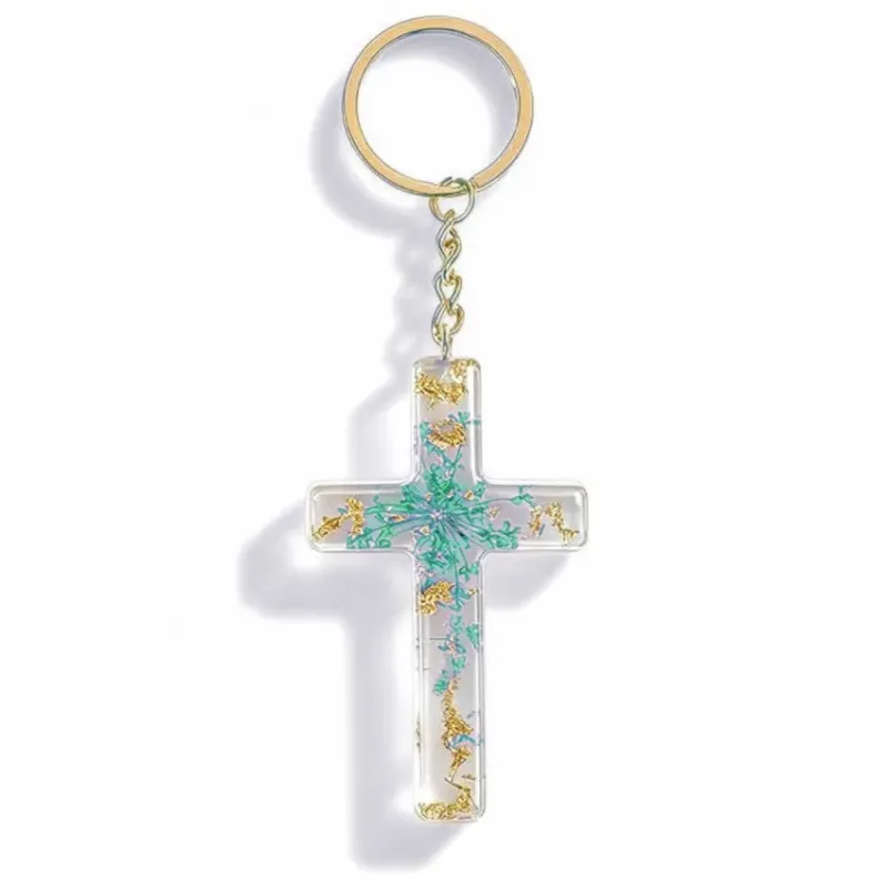 Porte-clé croix avec inclusions de fleurs - turquoise